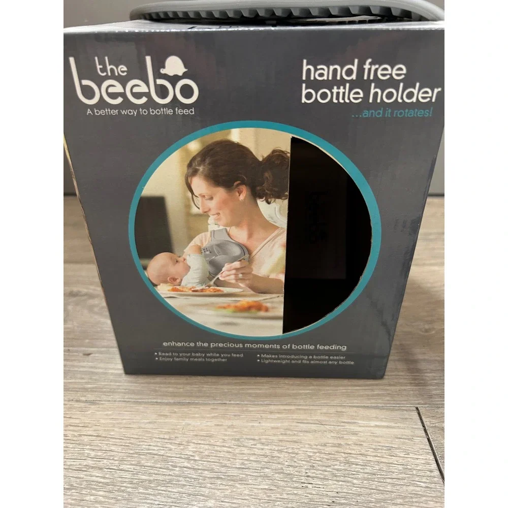 The Beebo Hands Free Bottle Holder Charcoal Gray Baby Feeding Accessory Rotating